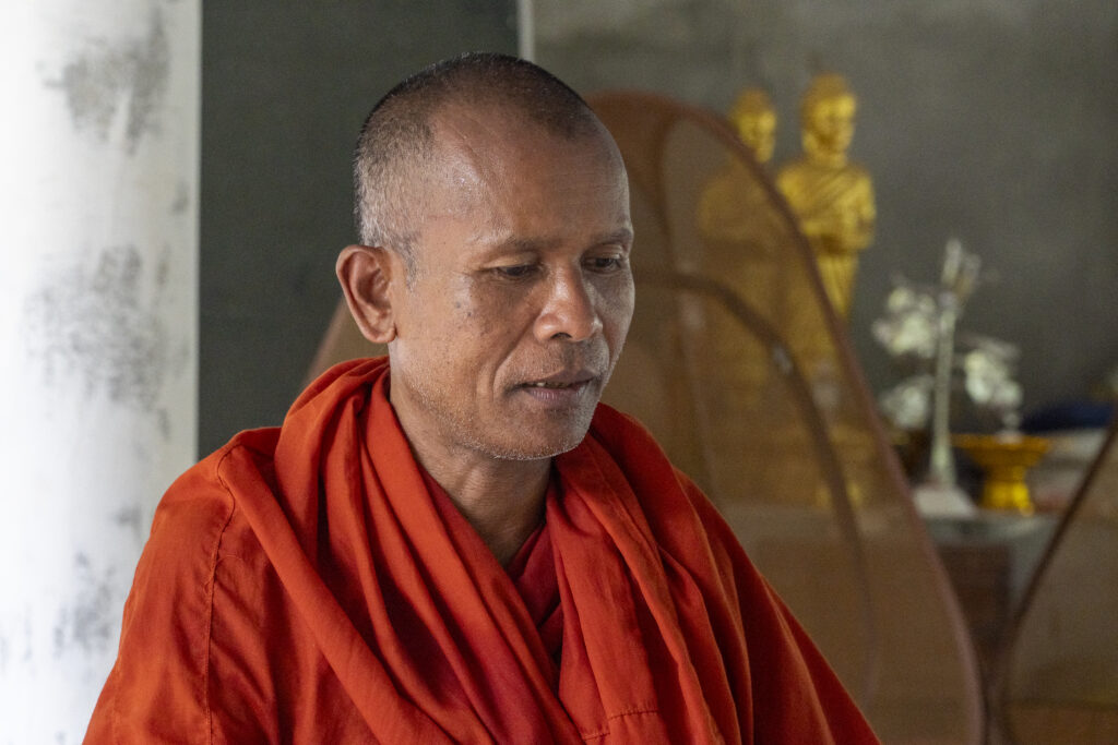 Prum Socheat, who goes by the nickname "Thomacheat", the Khmer word for nature, was an original founder of the forest protection NGO Mother Nature Cambodia, but also led the decision to dissolve the legal entity. Socheat remained at the pagoda in Metta Forest on April 8, 2025, saying he will stay there until the forest is gone. (Meng Kroypunlok/Mekong Independent)