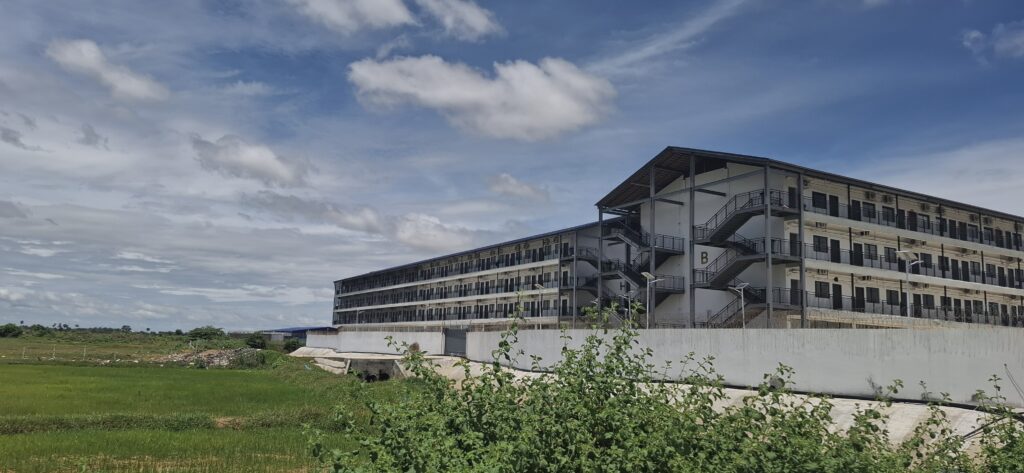 A reported scam compound in Cambodia's Takeo province, called Mango 2 Park or Taizi compound, on August 13, 2025. (Danielle Keeton-Olsen/Mekong Independent)